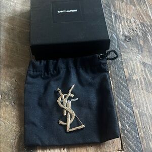 Saint Laurent YSL Logo Brooch in Black and Gold